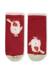 Red socks featuring a bird design in pink, with accents of white and brown. The texture is knitted, and the cuffs are light-colored.