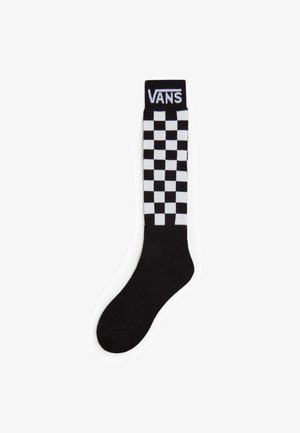 Zwart-wit geblokt crew sock met een effen zwarte voet en een geribbelde zwarte boord met het "VANS" logo in het wit aan de bovenkant.