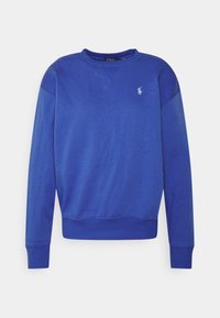 Blå långärmad sweatshirt med rund halsringning och ribbade ärmslut och nederkant, med en liten vit broderad logotyp på vänster bröst.