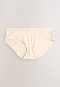 Biancheria intima hipster da donna in cotone beige con un piccolo fiocco decorativo al centro della fascia in vita, mostrata piatta su sfondo chiaro.