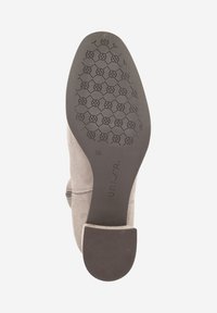 Gray suede ankle boot with a textured rubber sole, featuring a rounded toe and side zipper detail. Size 38 marked on the sole.