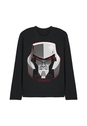 Black long-sleeve shirt with a large gray robotic face illustration with red eyes and "Transformers" text below the design.
