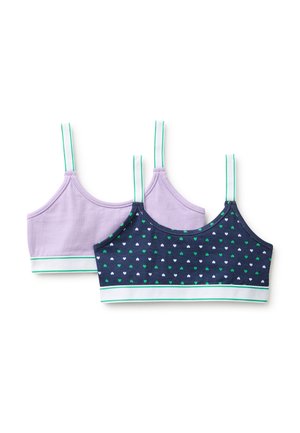 Twee meisjes crop tops met verstelbare witte en groene bandjes, één effen lavendel, de andere marineblauw met groene en witte hartjespatronen.