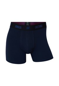 Marineblå bomuldsboxershorts med en sort linning med teksten "CR7" og "RONALDO" i blåt. Glat tekstur og tætsiddende design.
