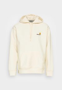 Felpa crema realizzata in tessuto morbido, caratterizzata da una tasca a marsupio, cappuccio con cordoncino e un logo sul petto in colori a contrasto.