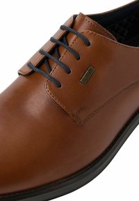 s.Oliver Stringate eleganti - dark cognac