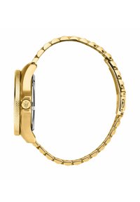 Orologio da polso in metallo dorato con una lunetta strutturata, cassa rettangolare e bracciale arrotondato caratterizzato da maglie lucide. Cassa del quadrante trasparente.