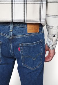 Levi's® 512® SLIM TAPER - Calças de ganga justas - z1962 medium indigo worn in