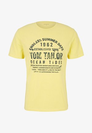 Maglietta gialla in cotone con testo nero serigrafato. Design con scollo rotondo, maniche corte e vestibilità comoda.