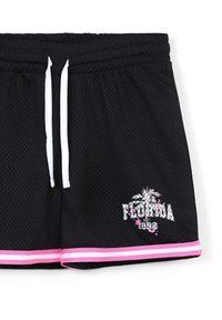 Shorts neri in rete con lacci bianchi, rifiniture rosa e bianche, e testo "Florida est 1992" accompagnato da una grafica di palma sulla gamba.