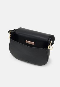 Coccinelle Rankinė - noir