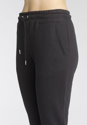 SCHLUPF - Tracksuit bottoms - schwarz