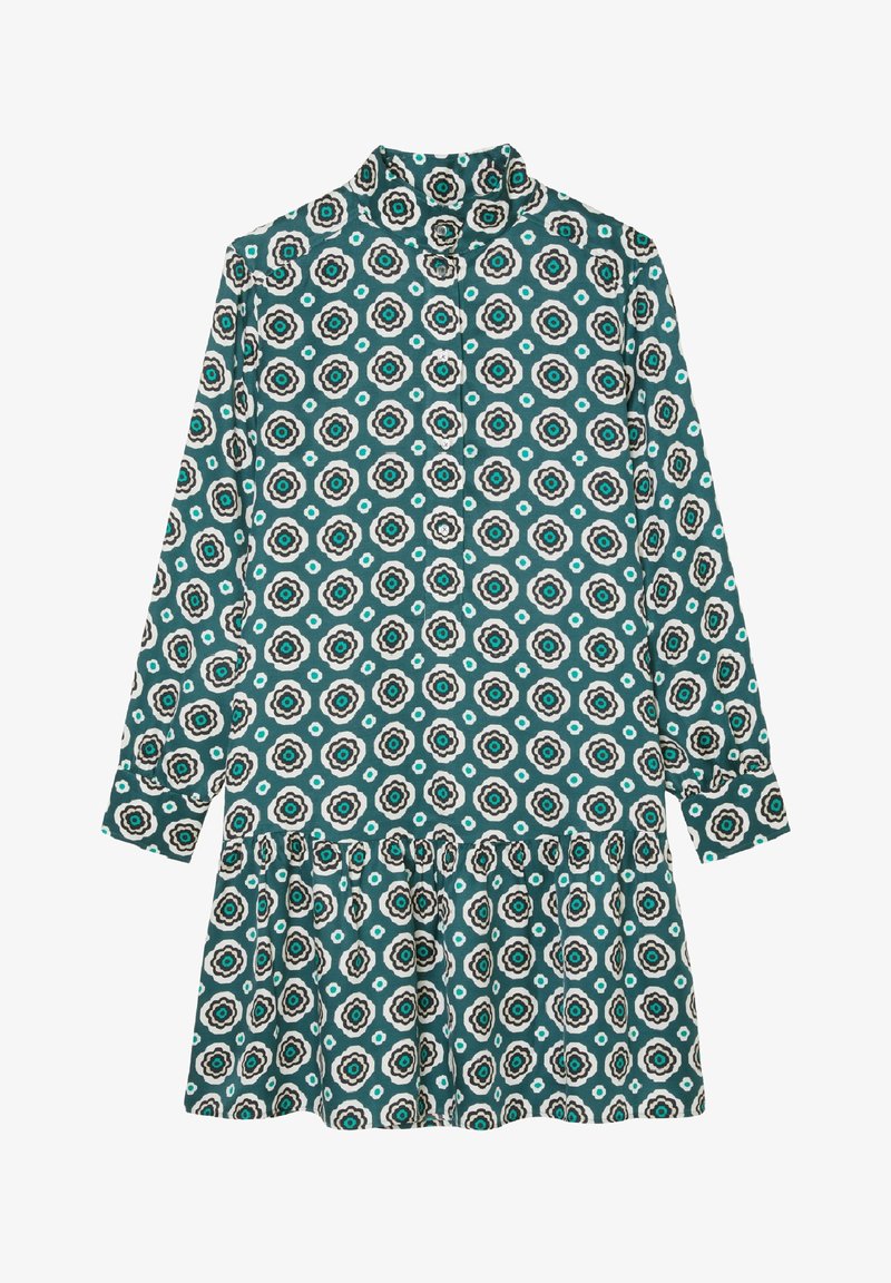 Robe verte à manches longues avec motif floral circulaire blanc et noir, col montant, boutons sur la poitrine, et ourlet froncé à volants.