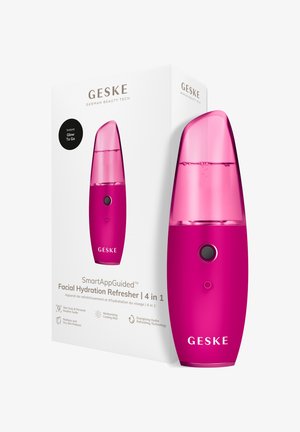 Bærbar pink ansigtsfugtgivende opfriskningsenhed med gennemsigtigt låg, tænd/sluk-knap og medfølgende hvid produktæske.