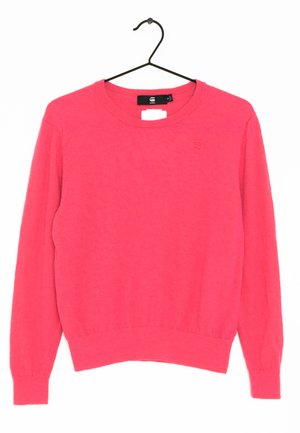 Pink sweater with long sleeves, round neckline, ribbed cuffs, and hem. Soft texture. Features a small logo accent on the chest.
