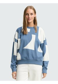 Blauw-witte pullover sweatshirt met abstracte vormen, ronde hals en ribgebreide manchetten en zoom. Zacht materiaal met een ontspannen pasvorm.