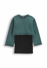 Przykrócona bluza w ciemnym turkusie o wyblakłej fakturze, z długimi rękawami i czarną żebrowaną dolną warstwą.