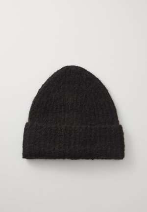 Black knitted beanie, featuring a textured fabric, rounded top, and folded cuff. Material appears soft and warm.