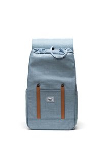 Light blue backpack with a roll-top design, brown leather straps, and a front pocket. Durable fabric with a textured finish and logo patch.