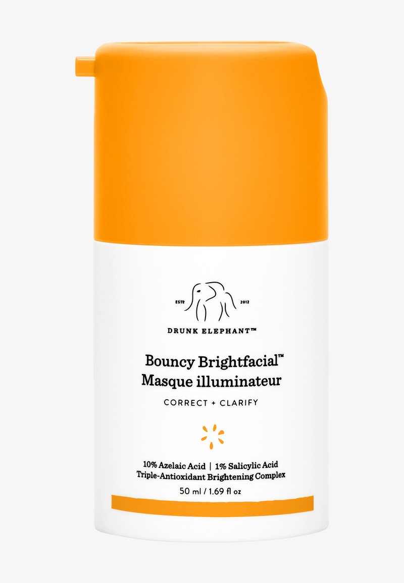 Drunk Elephant Bouncy Brightfacial™ in a white bottle with an orange cap. Contains 10% azelaic acid and 1% salicylic acid. 50 ml.