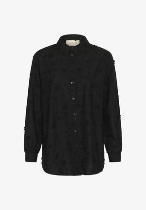 Crna košulja s dugim rukavima, cvjetnim vezom, kopčanjem sprijeda i klasičnom reverom. Mekani materijal i opušteni kroj.