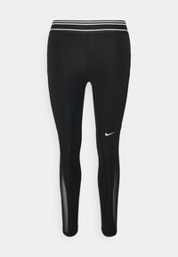 Svarta leggings i elastiskt material med figurnära design. Har ett midjeband med svart- och vitrandig design och en liten vit logotyp.