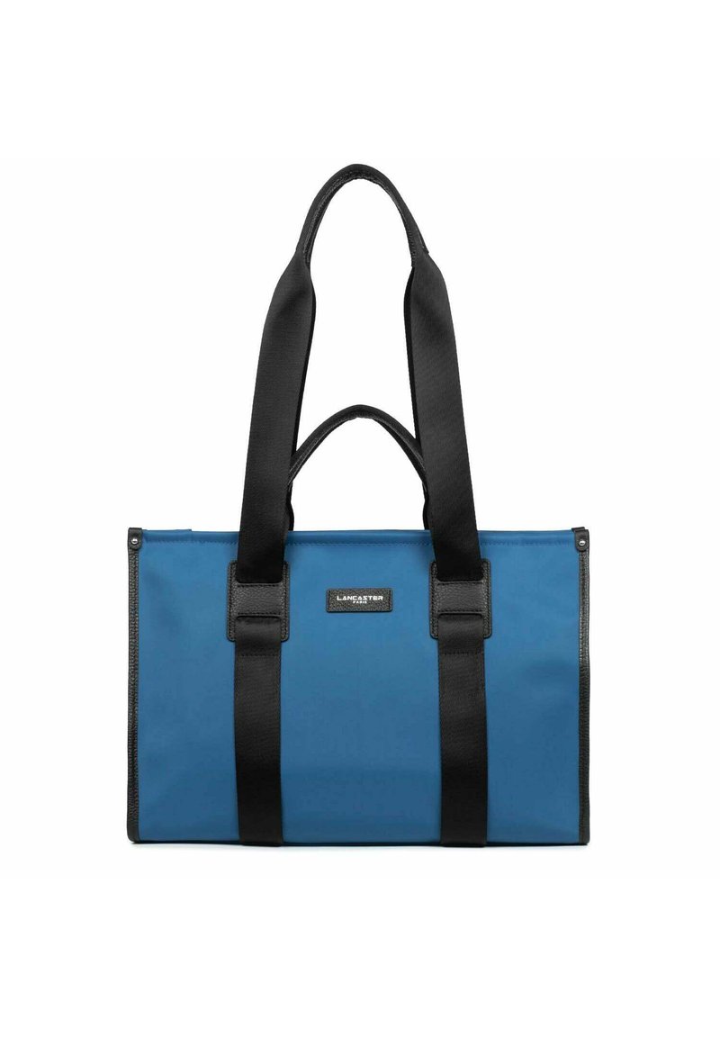 Borsa a tracolla blu realizzata in materiale resistente con manici e dettagli neri. Presenta una placca con logo e una forma rettangolare con chiusura a zip.