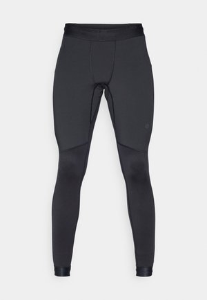 Juodos sportinės legės, pagamintos iš elastingos medžiagos, su glotniu paviršiumi ir prigludusia išvaizda. Į komplektą įeina platus liemens juostos dizainas ir kulkšnių apvadai.