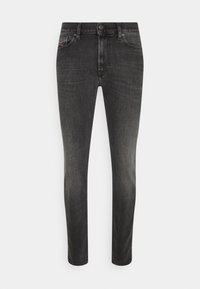 Smala jeans i mörkgrå denim, med en klassisk femfickdesign och knappstängning. Slät textur med minimal blekning.