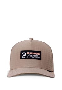 Beige cap with a textured grid pattern. Features a black rectangular patch with white and pink text. Curved brim and adjustable strap.
