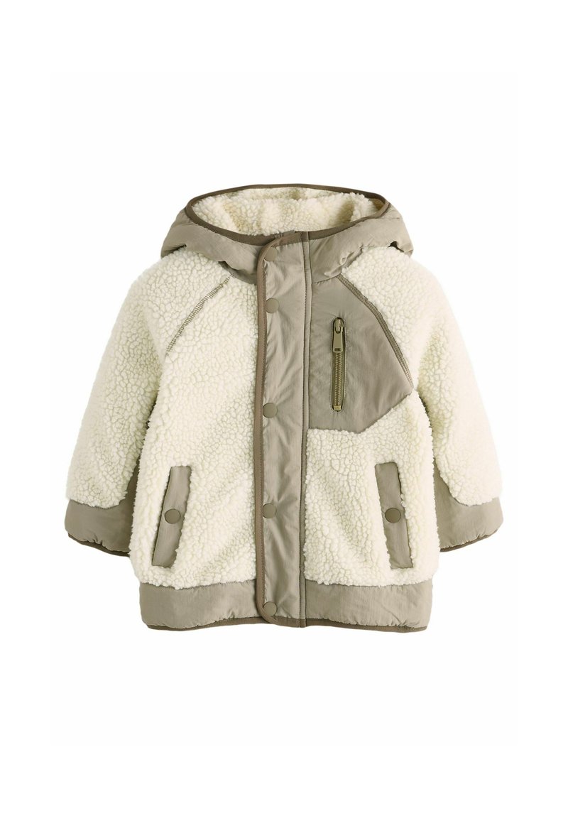 Cremefarbene Schafsleder- und Nylonjacke mit beige abgesetzten Nähten. Verfügt über eine Kapuze, Druckknopfverschlüsse und zwei seitliche Taschen sowie eine Reißverschlusstasche auf der Brust.