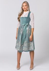 A teal dress with a fitted bodice and lace long sleeves, featuring intricate white floral embroidery at the hem and a satin belt.
