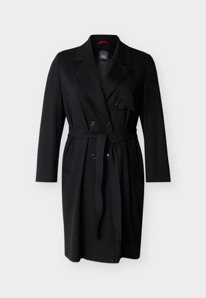 Black double-breasted trench coat with lapel collar, waist belt, long sleeves, and side pockets, displayed on a white background.