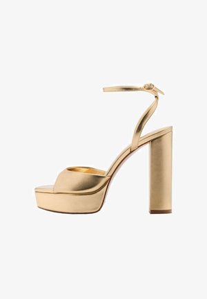 Sandali platform dorati con tacco spesso e cinturino alla caviglia. Realizzati in materiale metallico con design open-toe e texture liscia.