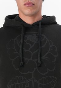 Marimekko SANOMA VIHKIRUUSU PLACEMENT UNISEX - Sportska majica - dark brown/grey