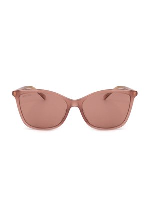 Occhiali da sole cat-eye marroni traslucidi con lenti tinta unita e sottili aste visibili dietro la montatura.