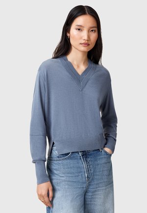 - Sweter
