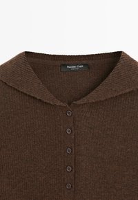 Brown ribbed knit cardigan with a wide collar and five dark buttons down the front, labeled Massimo Dutti.