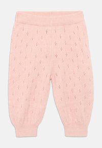 Leggings de punto en rosa claro con un patrón de diamantes texturizado, cintura acanalada y puños elásticos en los tobillos.