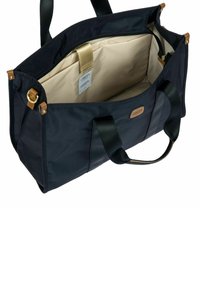 Borsa tote in nylon blu navy con manici neri, fodera interna beige, chiusura con zip e dettagli in pelle. Ampia e con molteplici scomparti.