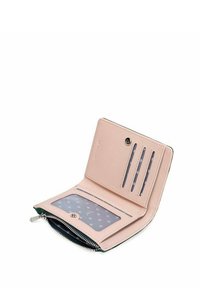 Light pink leather wallet with multiple card slots and a clear ID pocket. Zipper closure at the bottom, featuring polka dot lining.