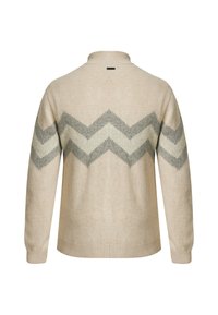 Beige trui met een zigzagpatroon in lichtgrijs en donkergrijs. Hoge kraag en geribde manchetten en zoom. Zachte textuur.