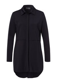 Schwarzes Langarmhemd mit spitzem Kragen, durchgehender Knopfleiste vorne und abgerundetem Saum. Hergestellt aus einem glatten, leichten Stoff.