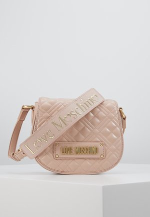 Quilted light pink Love Moschino crossbody bag with gold logo plate and wide strap featuring gold lettering and heart details.