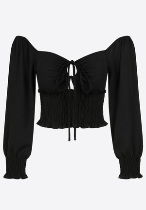 Sort kort top med skulderfrie ærmer, rynket bodice og bindedetalje foran. Lavet af et glat stof med en struktureret finish.