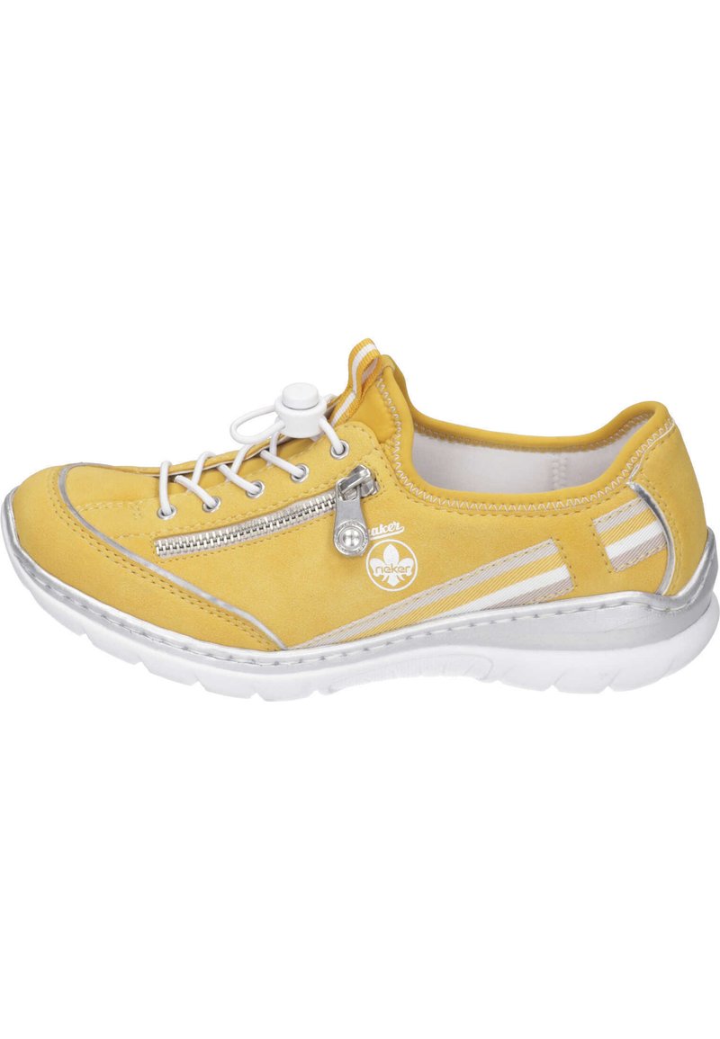 Yellow suede sneaker with a round toe, white lace-up closure, side zip, silver accents, and textured white sole. Soft lining interior.