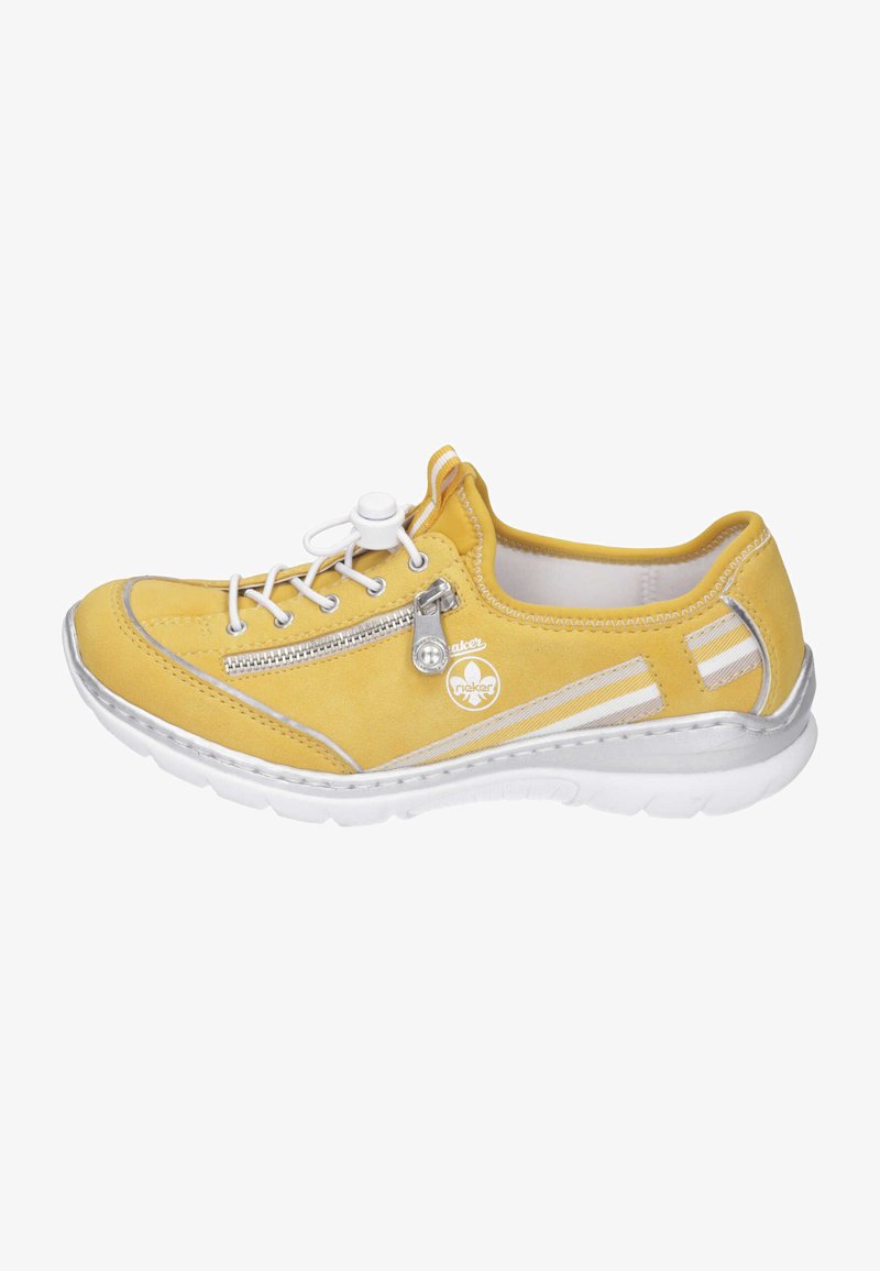 Yellow suede sneaker with a round toe, white lace-up closure, side zip, silver accents, and textured white sole. Soft lining interior.