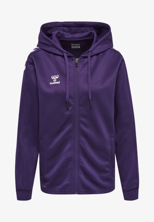 Lila zip-up huva jacka gjord av slätt tyg, med sidofickor, tre ränder på axlarna och en logotyp på bröstet.