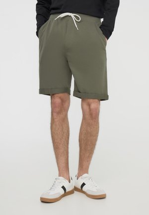 - Spodnie treningowe