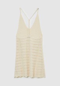 Débardeur en maille beige clair avec fines bretelles, décolleté en V et un motif texturé avec des détails en tricot ouvert.